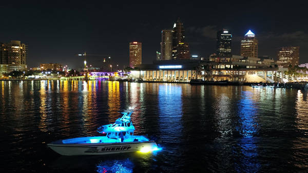 boat lit with LED lights visible from afar