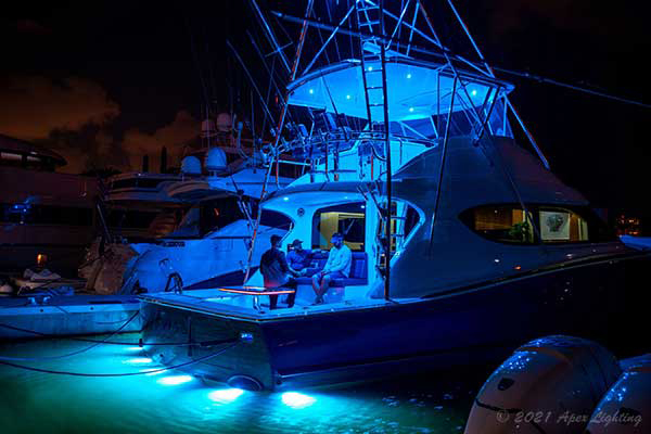 Lumitec Typhoon Underwater Lights on a Hatteras Yacht set to Blue